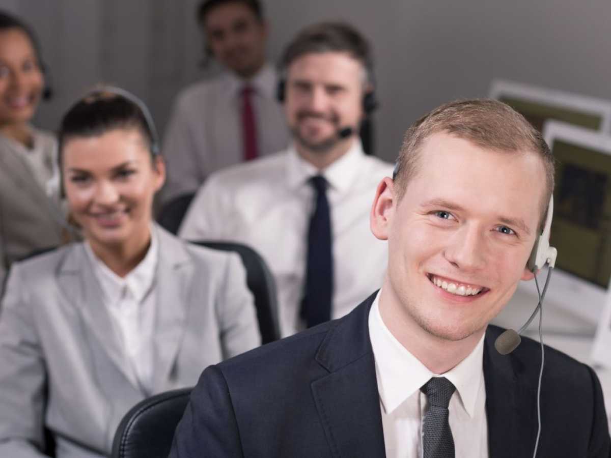 Smiling people in a call centre